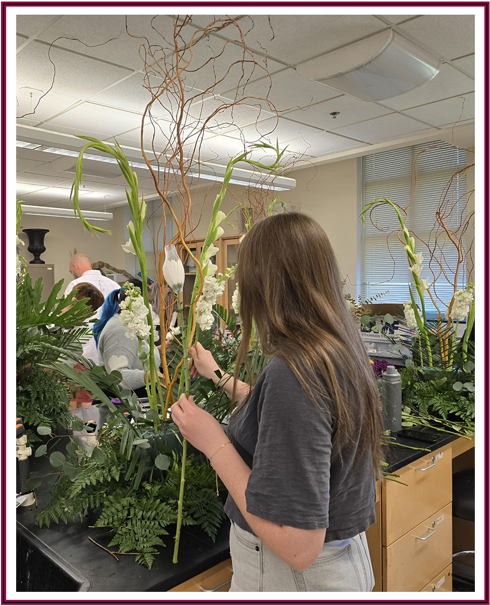 Floral club highlight - students working on a floral arrangement